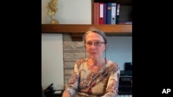 FILE - In this June 29, 2017 file photo, psychiatrist Dr. Lieve Thienpont poses during an interview with The Associated Press, in Ghent, Belgium.