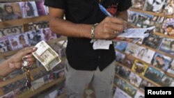 지난해 2월 쿠바 하바나 시의 레코드 가게. 쿠바는 2010년 라울 카스트로 의장의 경제개혁 선언으로 자본주의 경제체제를 도입하였다.
