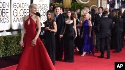 Actress Taylor Schilling arrives at the 72nd annual Golden Globe Awards at the Beverly Hilton Hotel Jan. 11, 2015, in Beverly Hills, California.