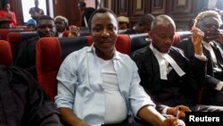 FILE - Nigerian activist and former presidential candidate Omoyele Sowore appears at the federal high court in Abuja, Nigeria, Dec. 5, 2019. 