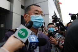 Media mogul Jimmy Lai leaves a police station after being arrested for illegal assembly during the anti-government protests in Hong Kong, China, Feb. 28, 2020.