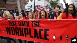 Participants march against sexual assault and harassment at the #MeToo March in the Hollywood section of Los Angeles on Nov. 12, 2017. 