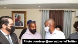 Rapper Kanye West, center, with Haitian President Jovenel Moïse, right, at the airport in Cap Haitien, Sept. 25, 2020. Photo courtesy @moisejovenel Twitter 