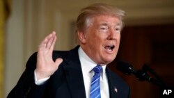 President Donald Trump speaks during a bill signing event for the "Department of Veterans Affairs Accountability and Whistleblower Protection Act of 2017" in the East Room of the White House, June 23, 2017, in Washington. 