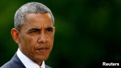 FILE- U.S. President Barack Obama speaks about the situation in Iraq from the South Lawn of the White House in Washington, June 13, 2014.
