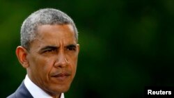 Presiden Obama mendesak Presiden Putin untuk menekan separatis Ukraina pro-Rusia agar mematuhi gencatan senjata selama seminggu dan menghentikan pengiriman senjata melintasi perbatasan dari Rusia ke Ukraina, Senin, 23 Juni 2014 (Foto: dok).