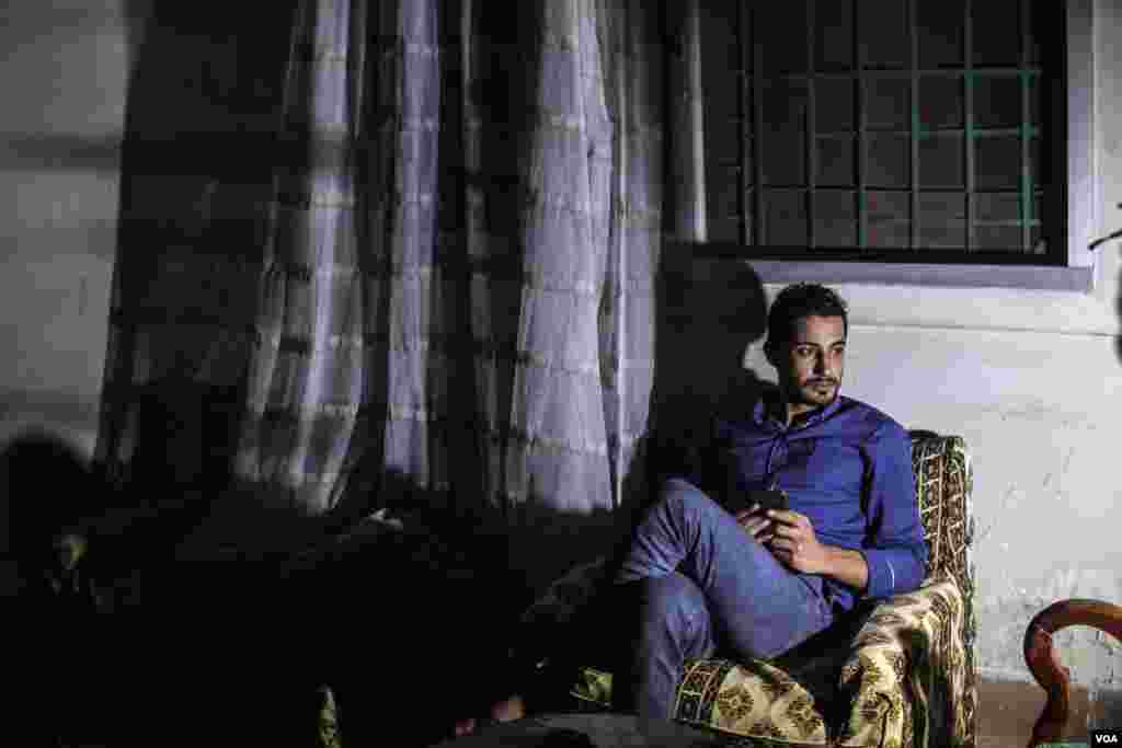 Islam Khalil, Nour&rsquo;s brother, was held without charges for 122 days. &ldquo;The officers tied cloths over our eyes and called us by number instead of by name.&rdquo; While in jail, Islam Khalil took names and other details of other prisoners who said they were arrested and their families never informed. As he left, one prisoner touched him in a gesture Islam Khalil understood to mean, &ldquo;Don&rsquo;t forget us.&rdquo;&nbsp; (H.Elrasam/VOA)