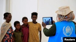 Faayilii - Hojjattuu UNHCR baqattootaa Itoophiyaa galmeessaa jirtu, Sudaan Saaasa 23, 2020. 