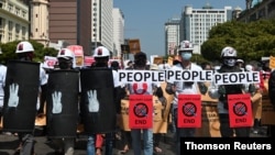 Protest against the military coup in Yangon, Feb. 17, 2021.
