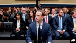 Facebook CEO Mark Zuckerberg arrives to testify before a House Energy and Commerce hearing on Capitol Hill in Washington, Wednesday, April 11, 2018. (AP Photo/Andrew Harnik)