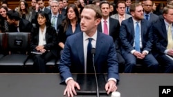 Facebook CEO Mark Zuckerberg arrives to testify before a House Energy and Commerce hearing on Capitol Hill in Washington, Wednesday, April 11, 2018. (AP Photo/Andrew Harnik)