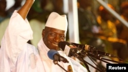 FILE - Gambia's then-President Yahya Jammeh smiles during a rally in Banjul, Gambia, Nov. 29, 2016.