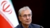 FILE - Iran's government spokesman Ali Rabiei speaks during a press briefing in Tehran, Iran, July 7, 2019. 