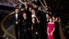Kwak Sin Ae and Bong Joon-ho win the Oscar for Best Picture for "Parasite" at the 92nd Academy Awards in Los Angeles, Calif., Feb. 9, 2020. 