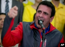 FILE - Opposition leader Henrique Capriles speaks during a press conference in Caracas, Venezuela, Oct. 21, 2016.