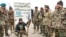 Afghan security forces posing to camera in front of a so-called Afghanistan Islamic Emirates custom house sign the reads “Do no pass without custom house tariff. Jan. 13. 2020. (Photo courtesy of Afghan Ministry of Defense)