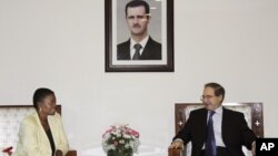 UN Under-Secretary-General for Humanitarian Affairs and Emergency Relief Coordinator, Valerie Amos, meets with Faisal Mekdad Syrian Ambassador to UN, during a press conference in Damascus, Syria, August 14, 2012.