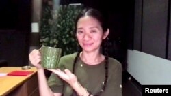 Chloe Zhao accepts the Best Director - Motion Picture award for "Nomadland" in this handout screen grab from the 78th Annual Golden Globe Awards in Beverly Hills, California, U.S., February 28, 2021. (NBC Handout via REUTERS)