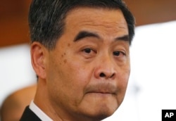 Hong Kong Chief Executive Leung Chun-ying answers questions from media during a press conference in Hong Kong Government House, Oct. 16, 2014.