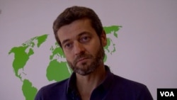 Jean-Francois Julliard of Greenpeace France says a trade pact will erode European health and environmental standards. (L. Bryant/VOA)