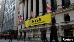 The Snapchat logo is seen on a banner outside the New York Stock Exchange (NYSE) in New York City, U.S., November 16, 2016. REUTERS/Brendan McDermid