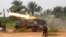 FILE - Congolese soldiers from the Armed Forces of the Democratic Republic of Congo [FARDC] launch missiles during their military operation against Ugandan Islamist group, the Allied Democratic Forces, outside the town of Beni, in North Kivu province, Dem