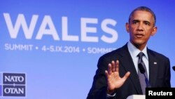 Presiden AS Barack Obama berbicara dalam KTT NATO di Resor Celtic Manor, Newport, Wales (5/9/2014). 