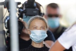 FILE - Climate activist Greta Thunberg arrives for a news conference in Berlin, Germany, Aug. 20, 2020.