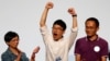 Student leader Nathan Law (C) celebrates on the podium after his win in the Legislative Council election in Hong Kong, China, Sept. 5, 2016. 