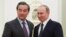 Russian President Vladimir Putin, right, shakes hands with Chinese Foreign Minister Wang Yi during their meeting in Moscow, Russia, March 11, 2016.