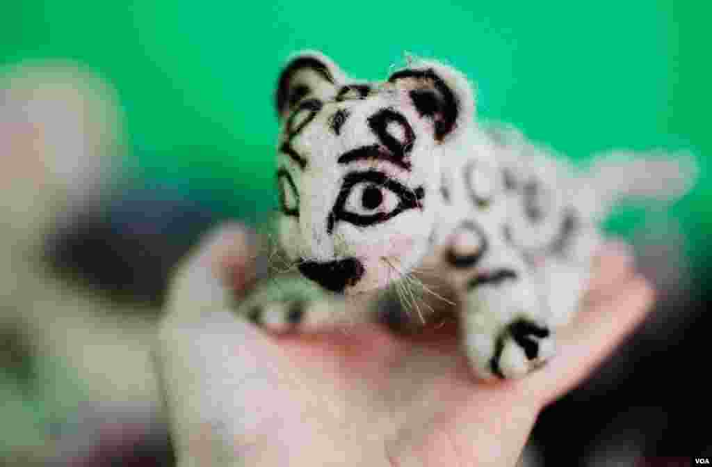 Muscovites ask visitors returning from the Altai: Did you see a Snow Leopard? No, but we bought little leopards fashioned out of felt, made from the pressed and matted wool of sheep raised in the Altai. (Vera Undritz for VOA)
