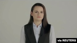 Belarusian opposition politician Sviatlana Tsikhanouskaya addresses the nation in Vilnius, Lithuania, in this still image taken from handout video released Aug. 21, 2020.