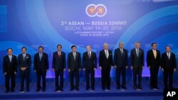 From left, Secretary General of the Association of Southeast Asian Nations (ASEAN) Le Luong Minh, Brunei's Sultan Hassanal Bolkiah, Cambodian Prime Minister Hun Sen, Indonesian President Joko Widodo, Laos Prime Minister Thongloun Sisoulith, Russian Presid