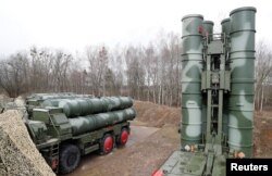 FILE - Russian S-400 surface-to-air missile systems are shown after their deployment at a military base outside the town of Gvardeysk, near Kaliningrad, Russia, March 11, 2019.
