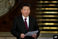 FILE - Chinese President Xi Jinping speaks with reporters in Tehran, Iran, Jan. 23, 2016. In recent years Xi has cracked down on corruption, but authorities also have censored news stories by foreign publications that explore financial gains by top officials and their relatives.
