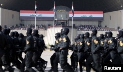 Iraqi Prime Minister Haider al-Abadi attends the celebrates victory over Islamic State militants with military parade in Baghdad, July 15, 2017.