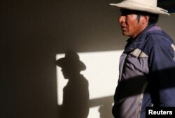 Cipriano Lima talks at his home in the town of Nueva Fuerabamba in Apurimac, Peru, Oct. 2, 2017.