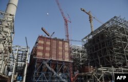A general view of a Chinese-backed power plant under construction, May 23, 2018, in Islamkot in the desert in the Tharparkar district of Pakistan's southern Sindh province.