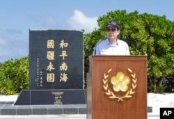 FILE - Taiwan's President Ma Ying-jeou speaks during his visit to Taiping Island, also known as Itu Aba, in the Spratly archipelago, south of Taiwan, in this Jan. 28, 2016, photo released by the Taiwan Presidential Office.