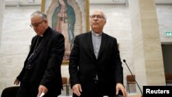 Chilean bishops Luis Fernando Ramos Perez and Juan Ignacio Gonzalez Errazuriz arrive for a news conference after a meeting with Pope Francis at the Vatican, May 18, 2018. (REUTERS/Max Rossi)