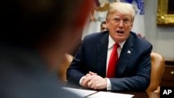 President Donald Trump speaks during a meeting of the President's National Council of the American Worker in the Roosevelt Room of the White House, Sept. 17, 2018, in Washington.
