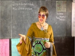 Asheri Kilo, secretary of state in Cameroon's ministry of basic education, is encouraged by students' interests in learning their native languages, in Yaounde, Feb. 21, 2020. (Moki Edwin Kindzeka/VOA)