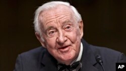 FILE - Retired Supreme Court Justice John Paul Stevens in Washington, April 30, 2014.