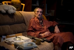 FILE - Harry Dean Stanton poses for a portrait in Los Angeles, Sept. 4, 2013.