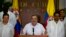 Commander of the Revolutionary Armed Forces of Colombia or FARC, Rodrigo Londono, better known as Timochenko or Timoleon Jimenez talks to the press, accompanied by Ivan Marquez, right, chief negotiator of the Revolutionary Armed Forces of Colombia and Pablo Catatumbo, left, chief of the FARC's western bloc, in Havana, Cuba, Sunday, August 28, 2016. 