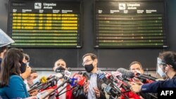 Peru's President Martin Vizcarra delivers a press conference at the Jorge Chavez International Airport in Callao, Peru, in Oct. 5, 2020.