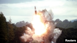 FILE - North Korea test-fires a weapon in this undated photo released Aug. 16, 2019, by the Korean Central News Agency. Pyongyang conducted another launch Aug. 23, violating an apparent promise to U.S. President Donald Trump to refrain from such tests.