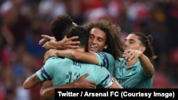 Les joueurs d’Arsenal jubilent après un lors d’un match amical remporté 5-1 contre PSG à Singapour, 28 juillet 2018.