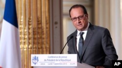 Presiden Perancis Francois Hollande dalam konferensi pers di Istana Elysee, Paris (7/9). 