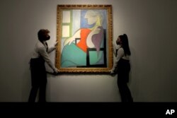 تابلو «زن نشسته» که پیکاسو آن را در ۱۹۳۲ کشید و بیش از یکصد میلیون دلار ارزش دارد.